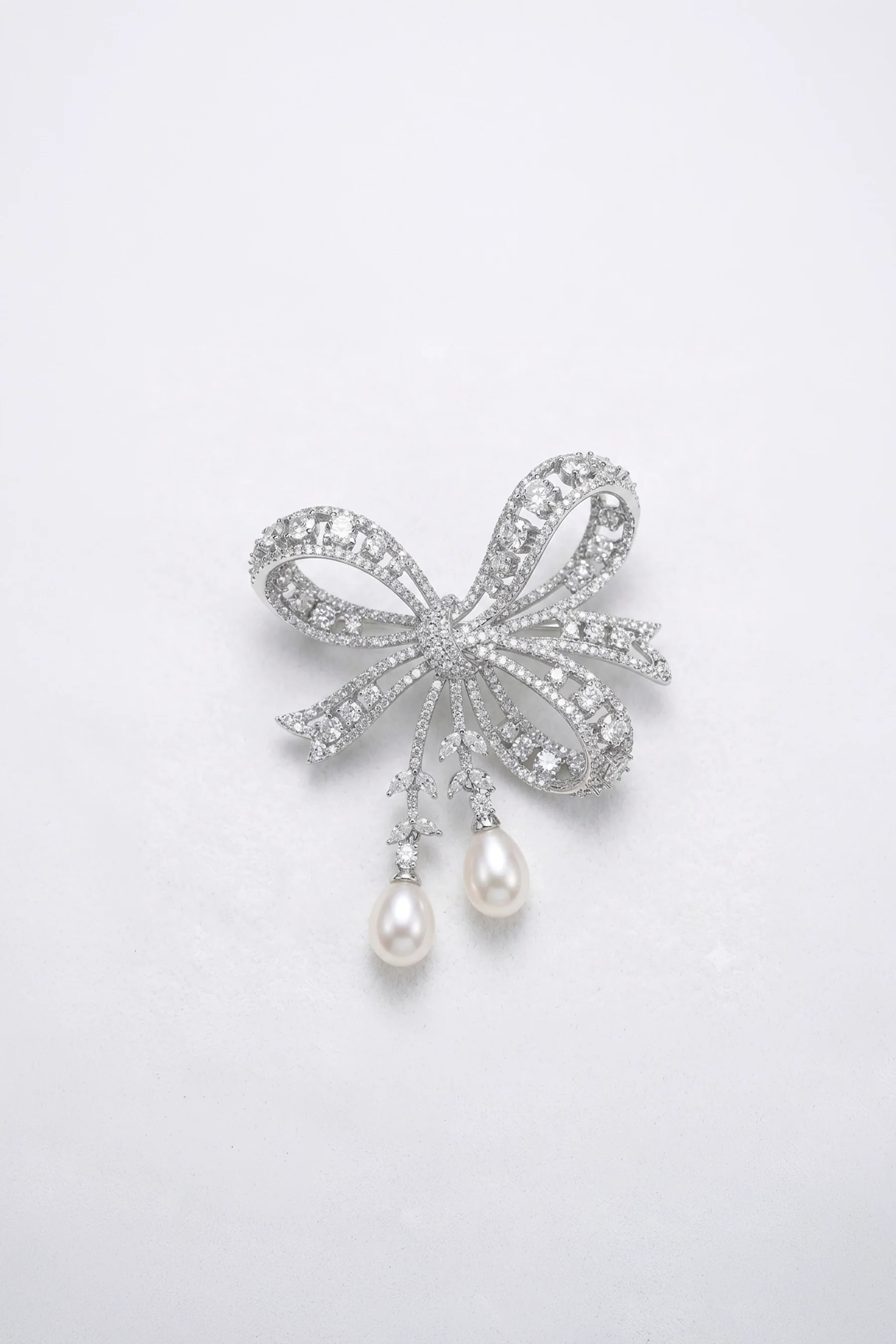 The Pearl Cascade Bow Taramati Brooch